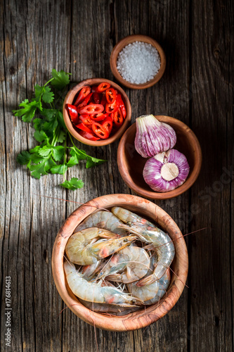 Preparation for tasty and sweet shrimp on wooden bowl