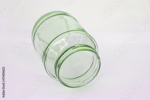 Close up glass bottle transparent blank isolated on white background.