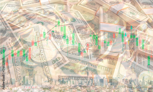 The conceptual multi exposure image of investment  financial and real estate market with dollar  gold coin  stock chart and building as represented symbols. The background image for investment market