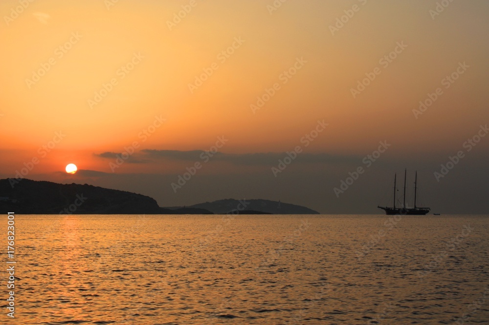 Ship watching sunrise in Ibiza Ship watching sunrise in Ibiza