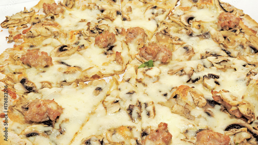 Close up of italian pizza Capricciosa - Selective focus Close up of italian pizza Capricciosa - Selective focus