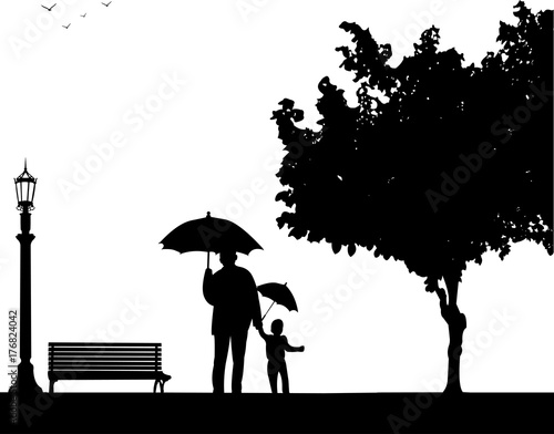 Grandfather walking with his grandson under the umbrellas in the park  one in the series of similar images silhouette