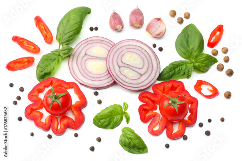 Fototapeta Naklejka Na Ścianę i Meble -  mix of slice of tomato, red onion, basil leaf, garlic, sweet bell pepper and spices isolated on white background. top view