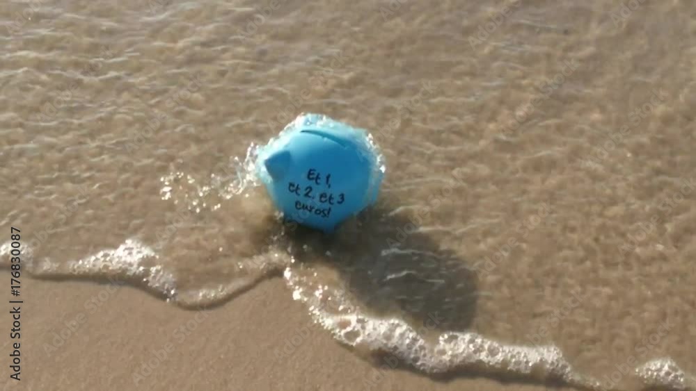 tirelire sur le sable