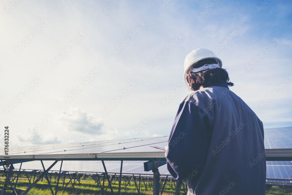 operation and maintenance in solar power plant ; engineer working on checking and maintenance in solar power plant ,solar power plant to innovation of green energy for life