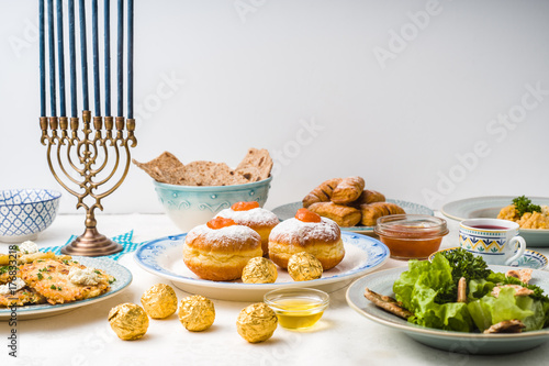 Fototapeta Jewish holiday Hanukkah, traditional feast side view