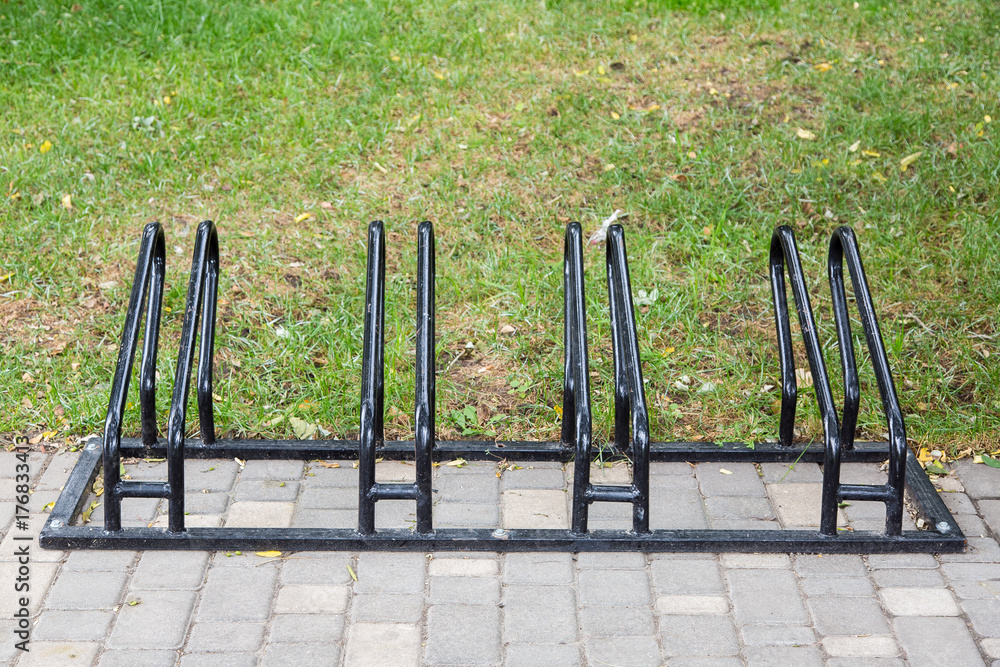 Fototapeta premium Bicycle parking of black color.