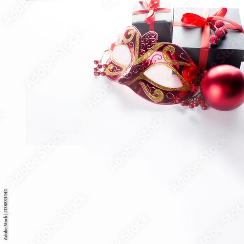 Black christmas  gift  box with red ribbon and nask photo