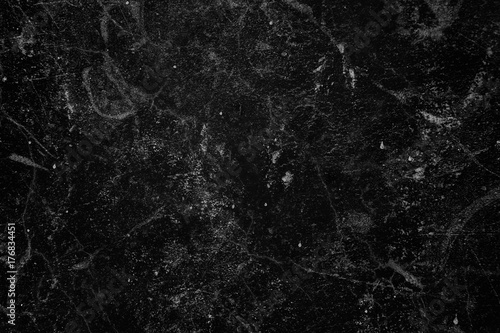 background of dark and grungy texture of concrete photo