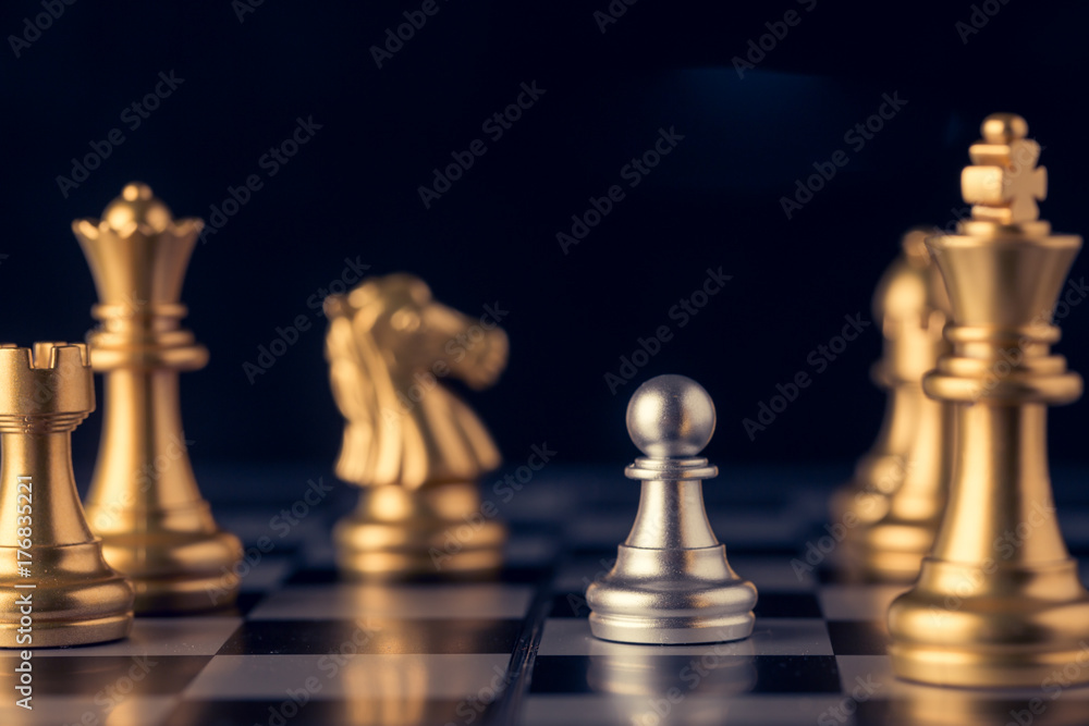 Chess on a chessboard at black background, Business leader concept. vintage tone. Chess on a chessboard at black background, Business leader concept. vintage tone.