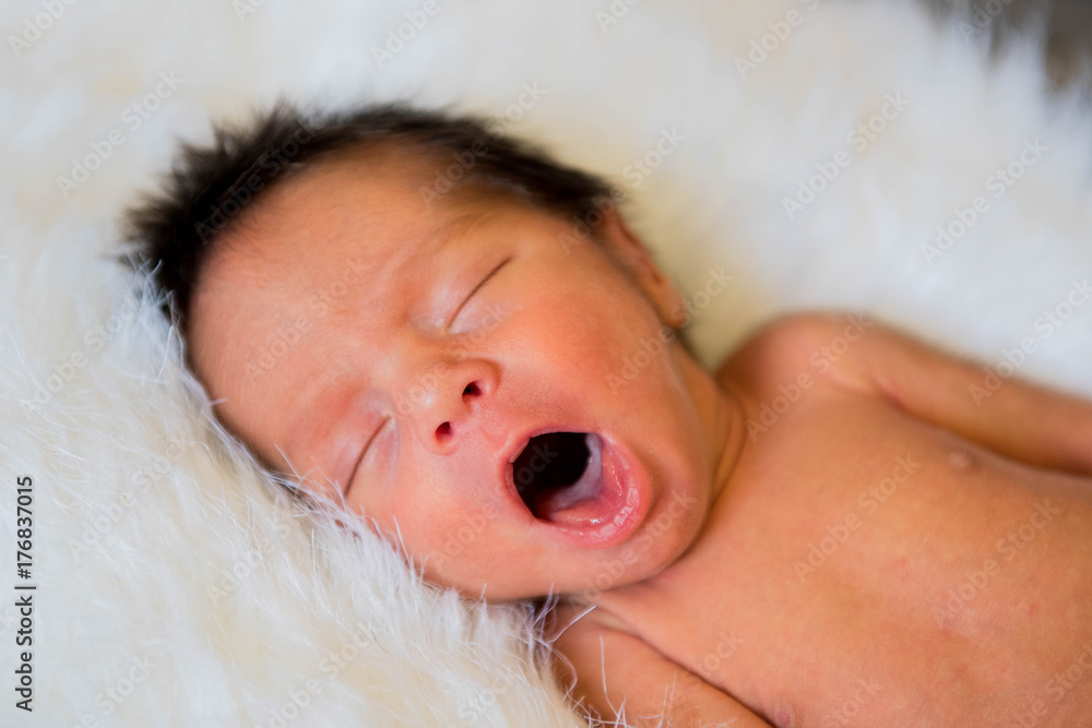 New born baby boy sleeping and yawn New born baby boy sleeping and yawn
