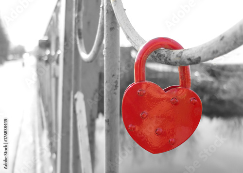 lock in shape of heart on the bridge. wedding tradition