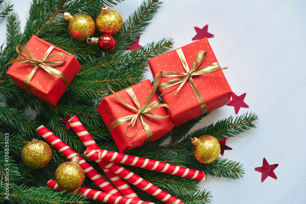 christmas composition, spruce branches to gifts in red boxes, christmas decor christmas composition, spruce branches to gifts in red boxes, christmas decor