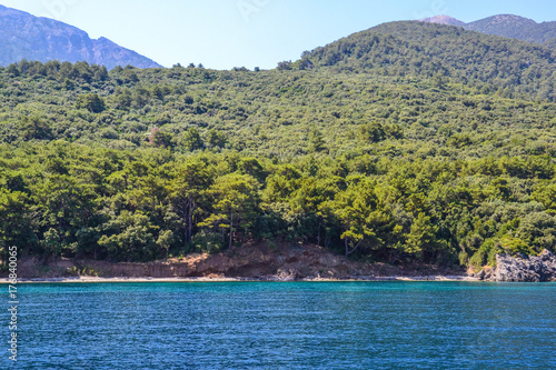 Forest and mountains on the shore of the Aegean Sea