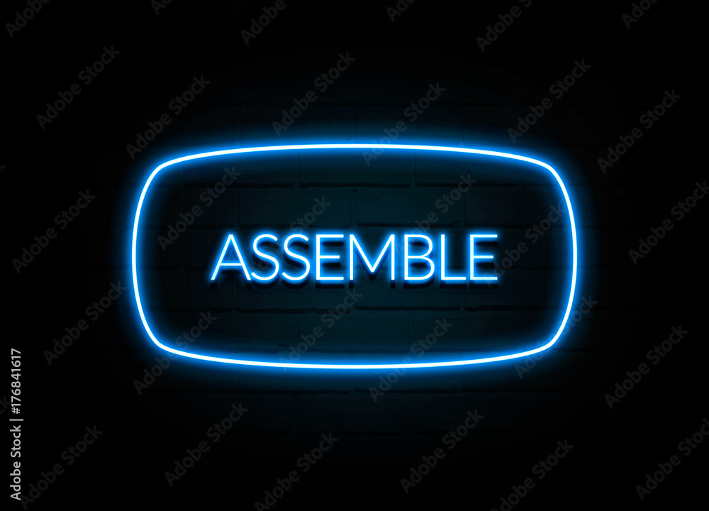 Assemble  - colorful Neon Sign on brickwall