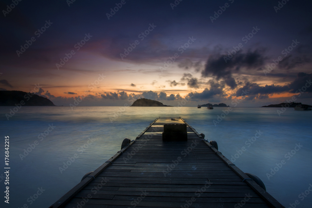 scenery of sunset at Redang Island,Terengganu,Malaysia. Soft focus,motion blur due to long exposure. visible noise due to high iso