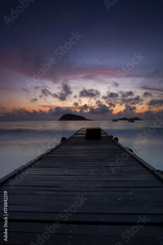 Fototapeta Naklejka Na Ścianę i Meble -  scenery of sunset at Redang Island,Terengganu,Malaysia. Soft focus,motion blur due to long exposure. visible noise due to high iso