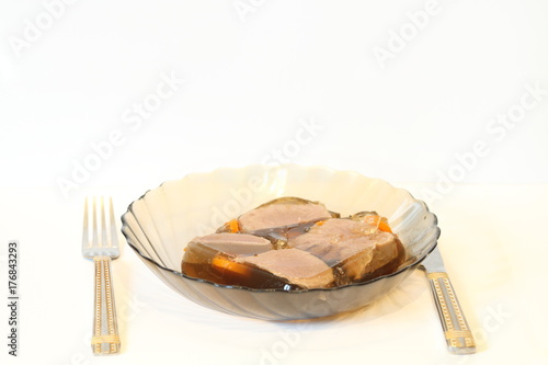 Jellied with meat, carrots, parsley, meat filling, horseradish photo