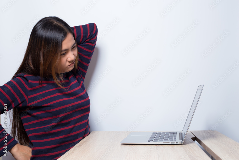 Naklejka premium Woman has neck pain from work