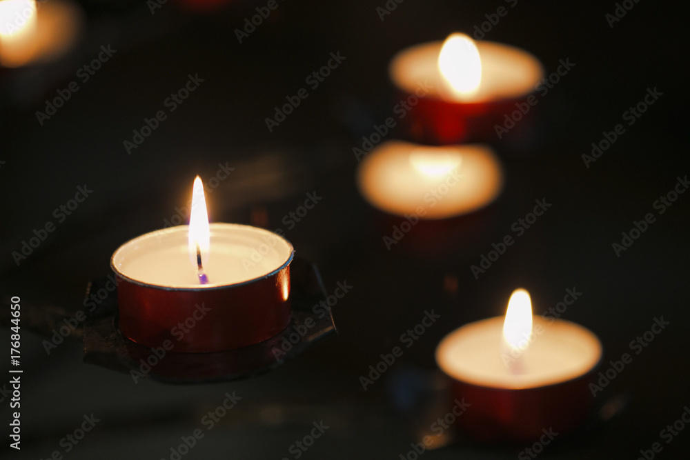 flame burning candles in a Catholic cathedral. flame burning candles in a Catholic cathedral.