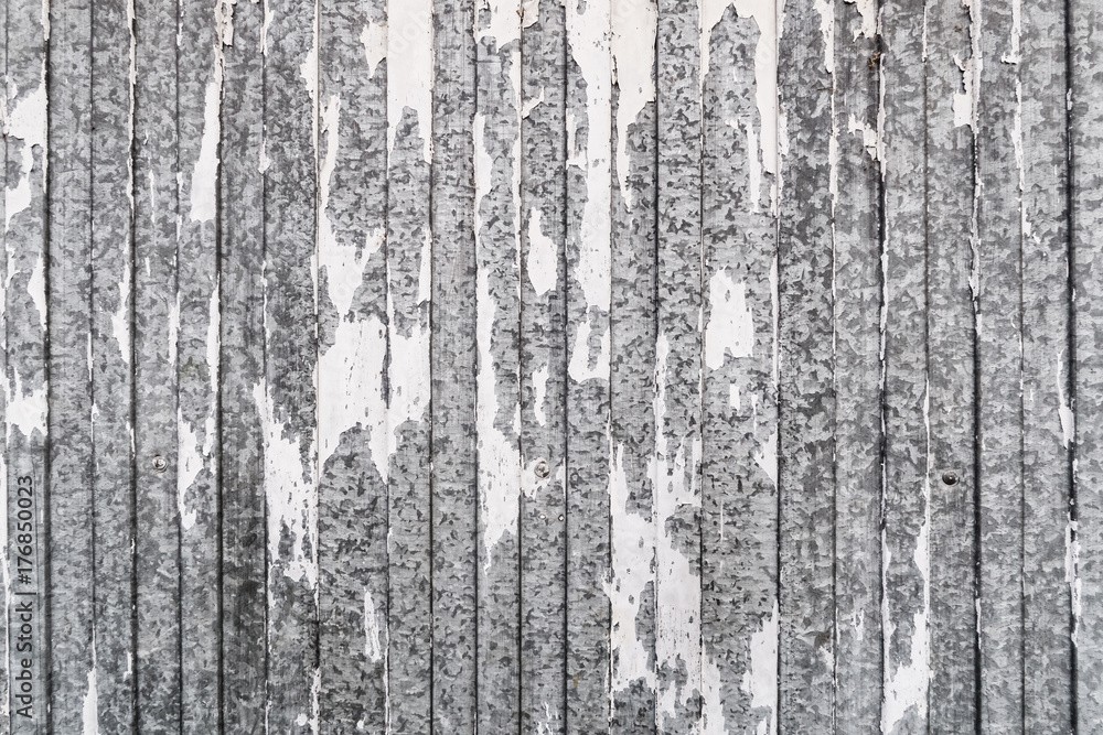 Background of sheet metal with white paint peeling off. Background of sheet metal with white paint peeling off.