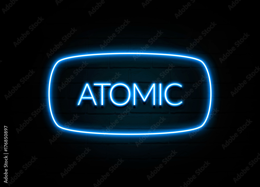 Atomic - colorful Neon Sign on brickwall Atomic - colorful Neon Sign on brickwall