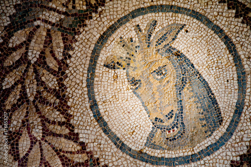 Old roman mosaics in the famous imperial Villa del Casale in Piazza Armerina, Sicily, Unesco world heritage of the 4th century A.C.