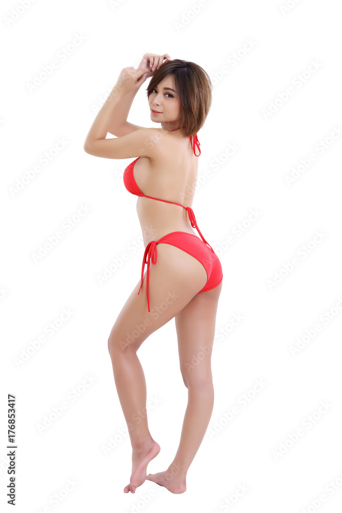 Beautiful young brunette Asian woman wearing red bikini isolated on white background Beautiful young brunette Asian woman wearing red bikini isolated on white background