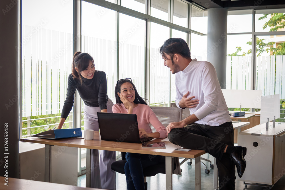 young asian businessman working with team in office young asian businessman working with team in office