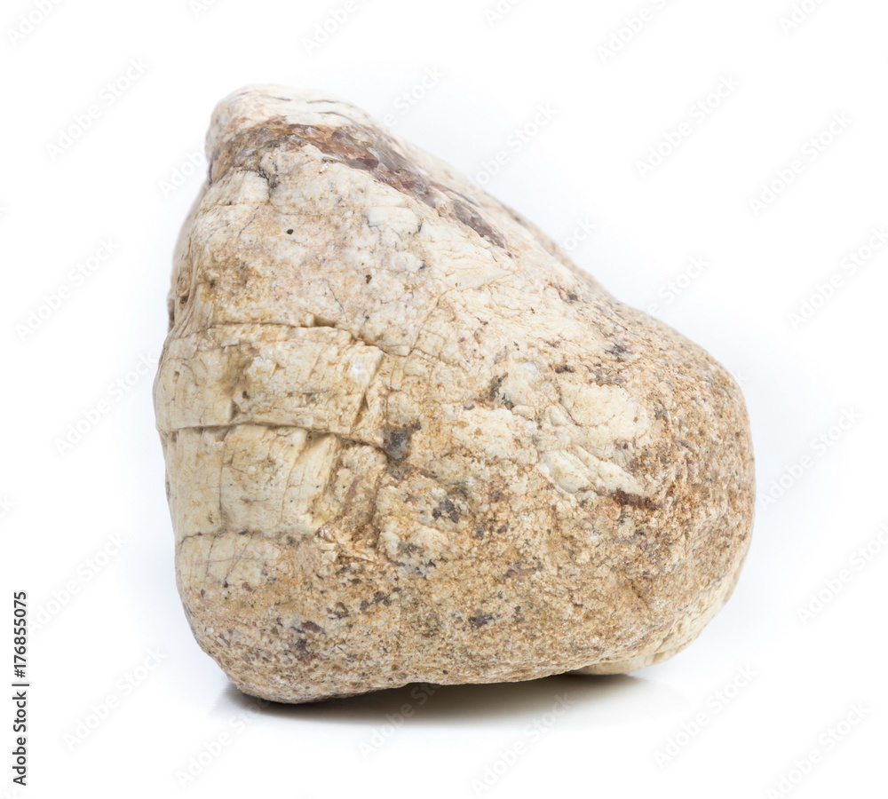 Single natural stone on white background, close-up Single natural stone on white background, close-up