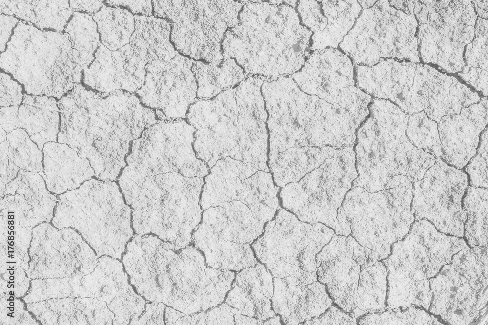 Soil drought cracks texture white background for design.