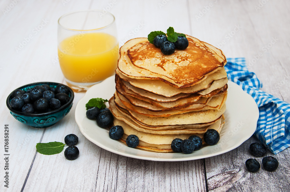 Plate with pancakes and blueberries Plate with pancakes and blueberries