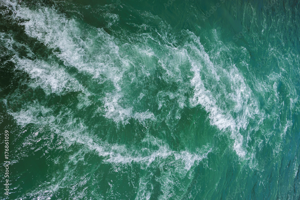 Fototapeta premium Turquoise river water texture background. 