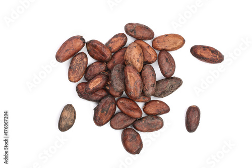 unpeeled cocoa bean isolated on white background close-up top view photo