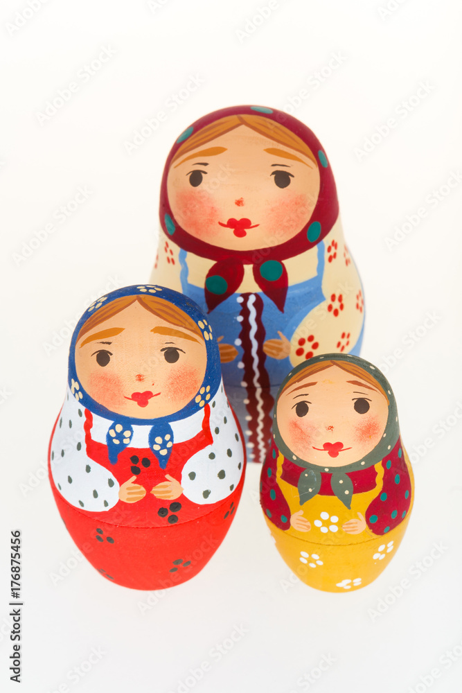 Three Russian dolls babushka matryoshka isolated on white background Three Russian dolls babushka matryoshka isolated on white background