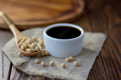 Beautiful soy sauce in a white ceramic bowl