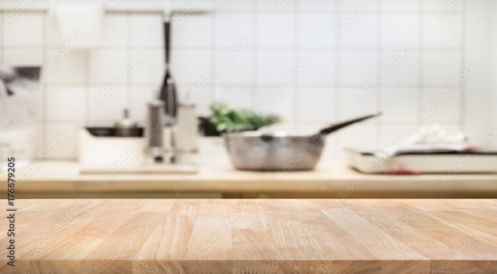 Wood table top on blur kitchen room background .For montage product display or  key visual layout. - obrazy, fototapety, plakaty 