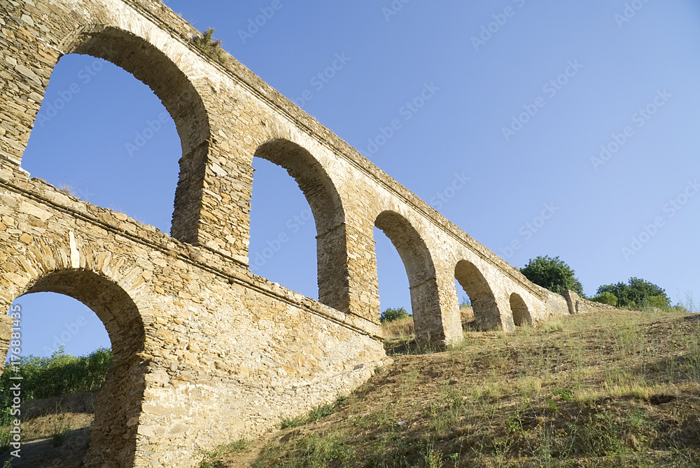 Aqueduct in Almunecar, Granada province, Andalusia, Spain                           