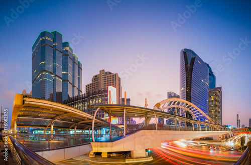 Bangkok - March 5 2017 : Public skywalk with Building architecture style modern of business area in Bangkok. This place is very popular that tourists like to take photos of modern architecture.