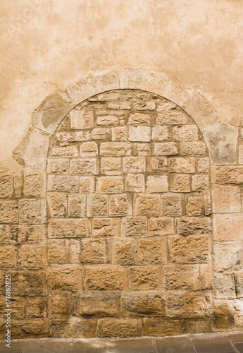 Ancient way close with stone brick wall