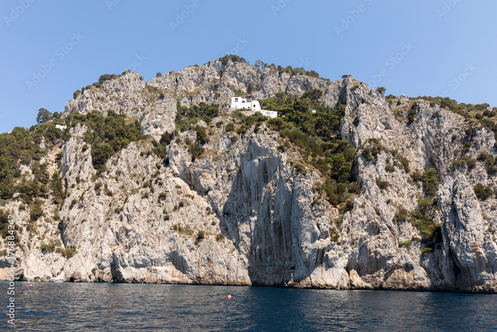 View from the boat on the cliff coast of Capri Island, Italy