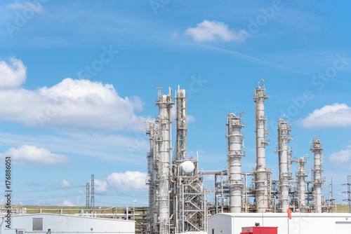 Oil refinery, oil factory, petrochemical plant in Pasadena, Texas, USA under cloud blue sky. photo