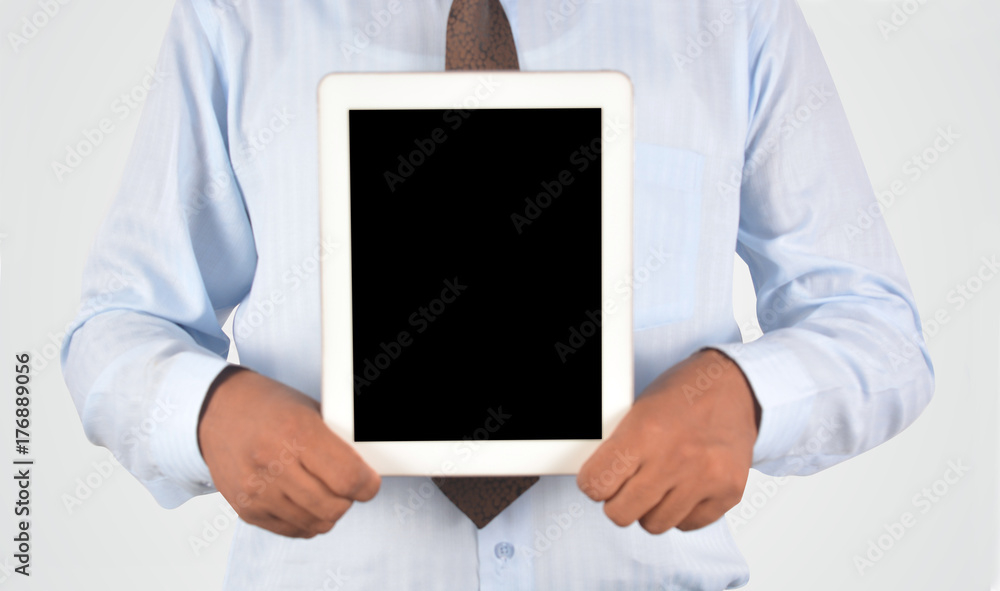 Businessman holding digital tablet pc, isolated very professionally Businessman holding digital tablet pc, isolated very professionally