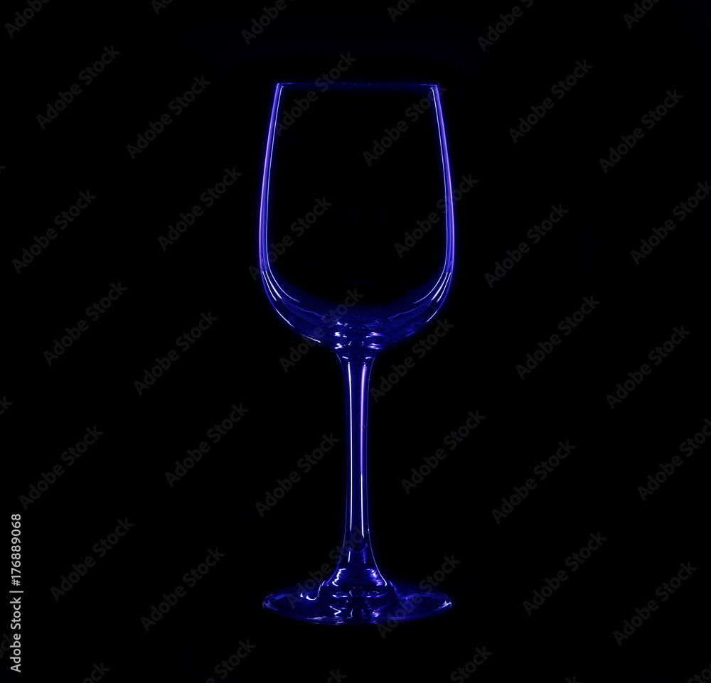 Silhouette of wineglass with blue and red illumination Silhouette of wineglass with blue and red illumination