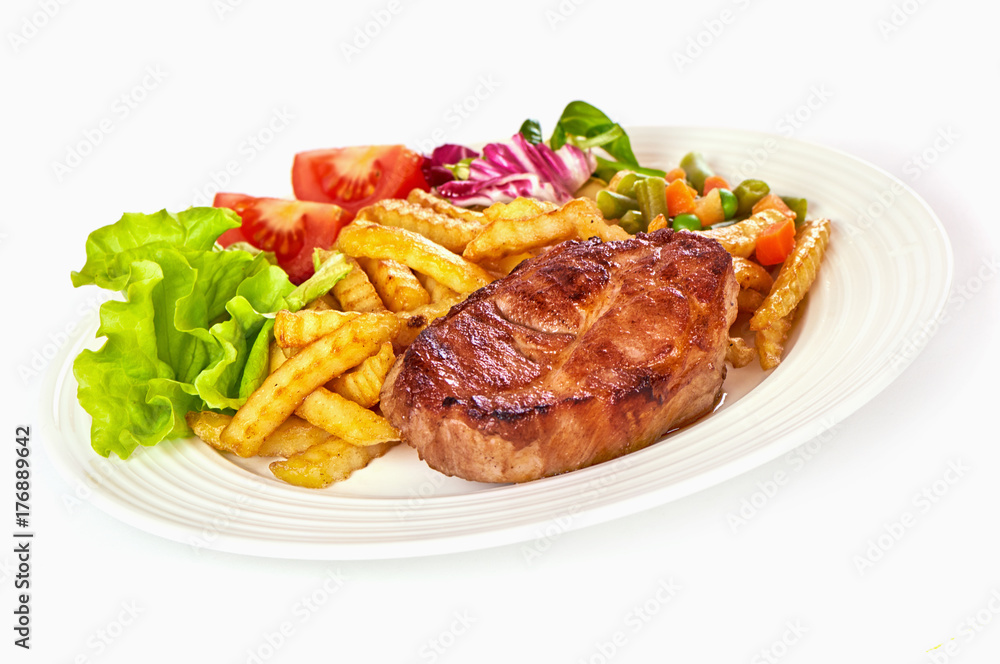 Grilled pork steak with fries isolated on white background Grilled pork steak with fries isolated on white background