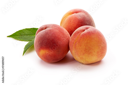 Peaches with leaf isolated on white background