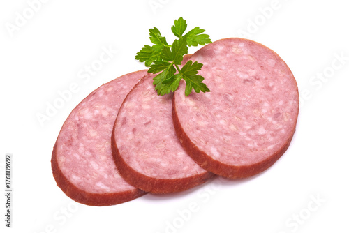 Salami smoked sausage slices isolated on white background photo