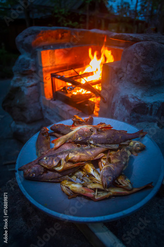 Smoked fish at the stake.