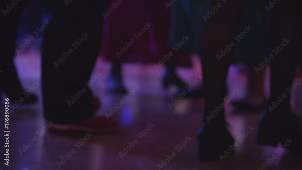 Amazing bottom shot of boots dancing a line dancing at a party. People having fun at disco club. Entertainment industry, friday night and holidays concept. Amazing bottom shot of boots dancing a line dancing at a party. People having fun at disco club. Entertainment industry, friday night and holidays concept.