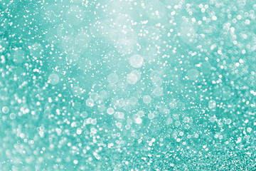 Abstract teal green glitter and aqua mint sparkle background
